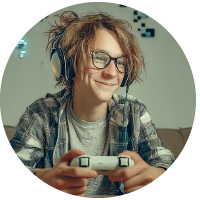 young boy happily playing video game with controller in his hand 